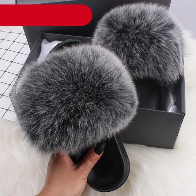 Stevvex women's indoor fur slippers featuring plush fuzzy open-toe slides with fur and feather details, ideal for cozy indoor wear.