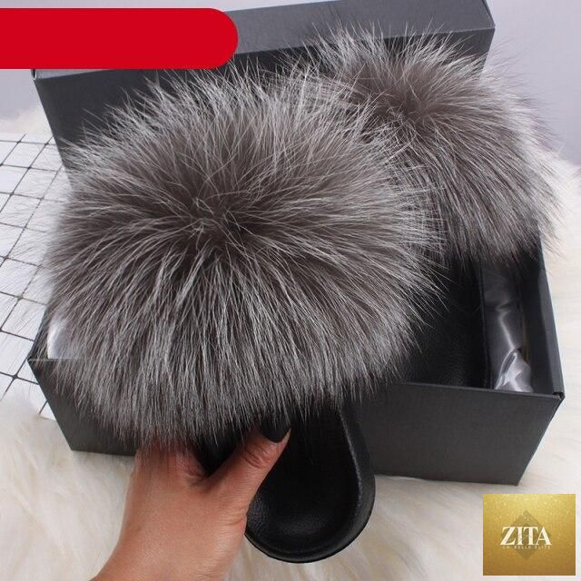 Stevvex women's indoor fur summer flat sandals with plush fuzzy open-toe design, featuring fox fur and feather accents.