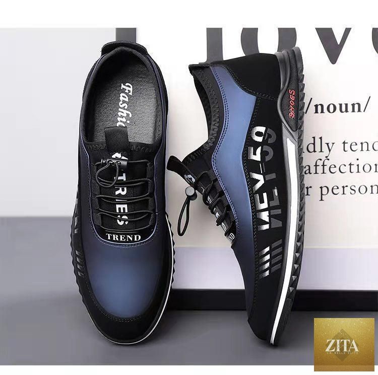 Stevvex men's black leather slip-on sneakers with low-top design, lightweight, breathable, anti-slip soles, ideal for casual and business wear.