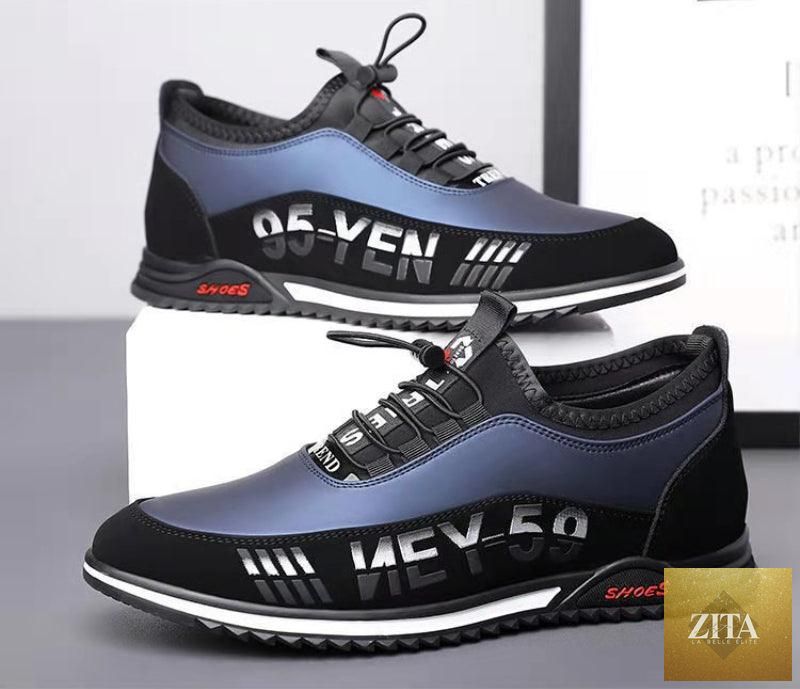 Stevvex men's black leather slip-on sneakers, lightweight casual driving shoes with anti-slip sole and breathable low-top design.
