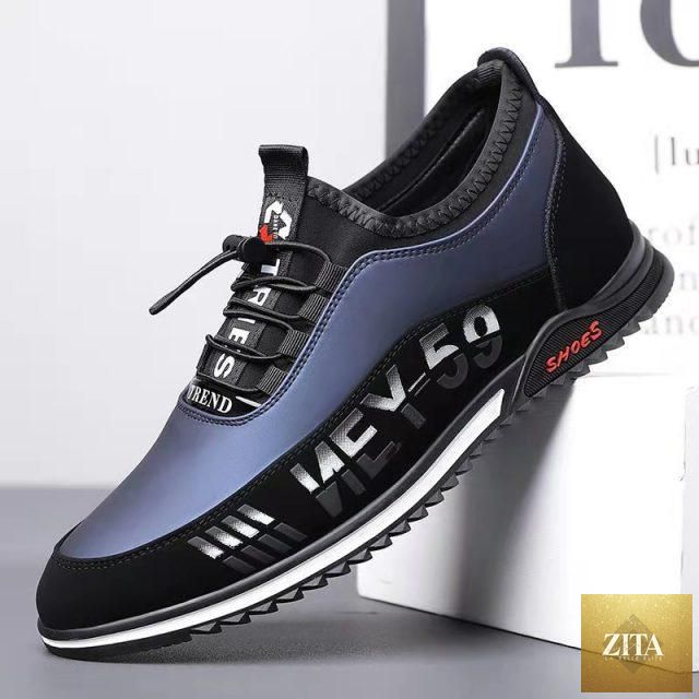 Stevvex men's black leather slip-on casual sneakers with low-top design, lightweight, breathable, anti-slip sole, suitable for walking and business.