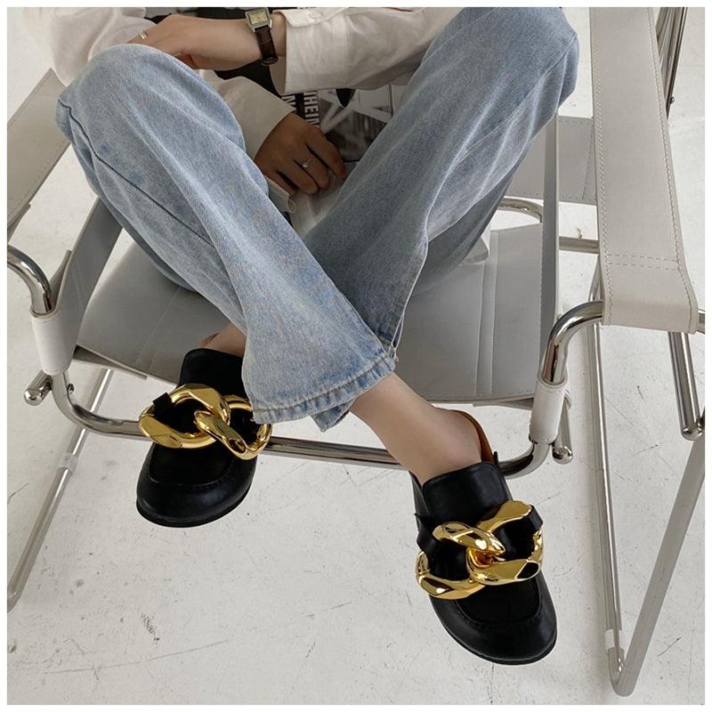 Stevvex women's slip-on slippers with metal chain design, closed round toe, low heels, casual flat slide sandals in gold.