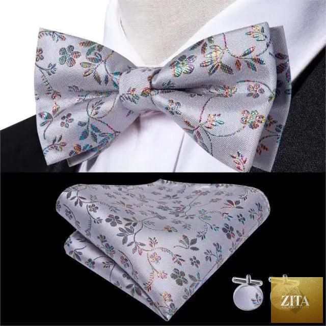 Elegant silk butterfly bow tie, pocket square, and cufflinks set for men, suitable for formal weddings and office wear by Stevvex.