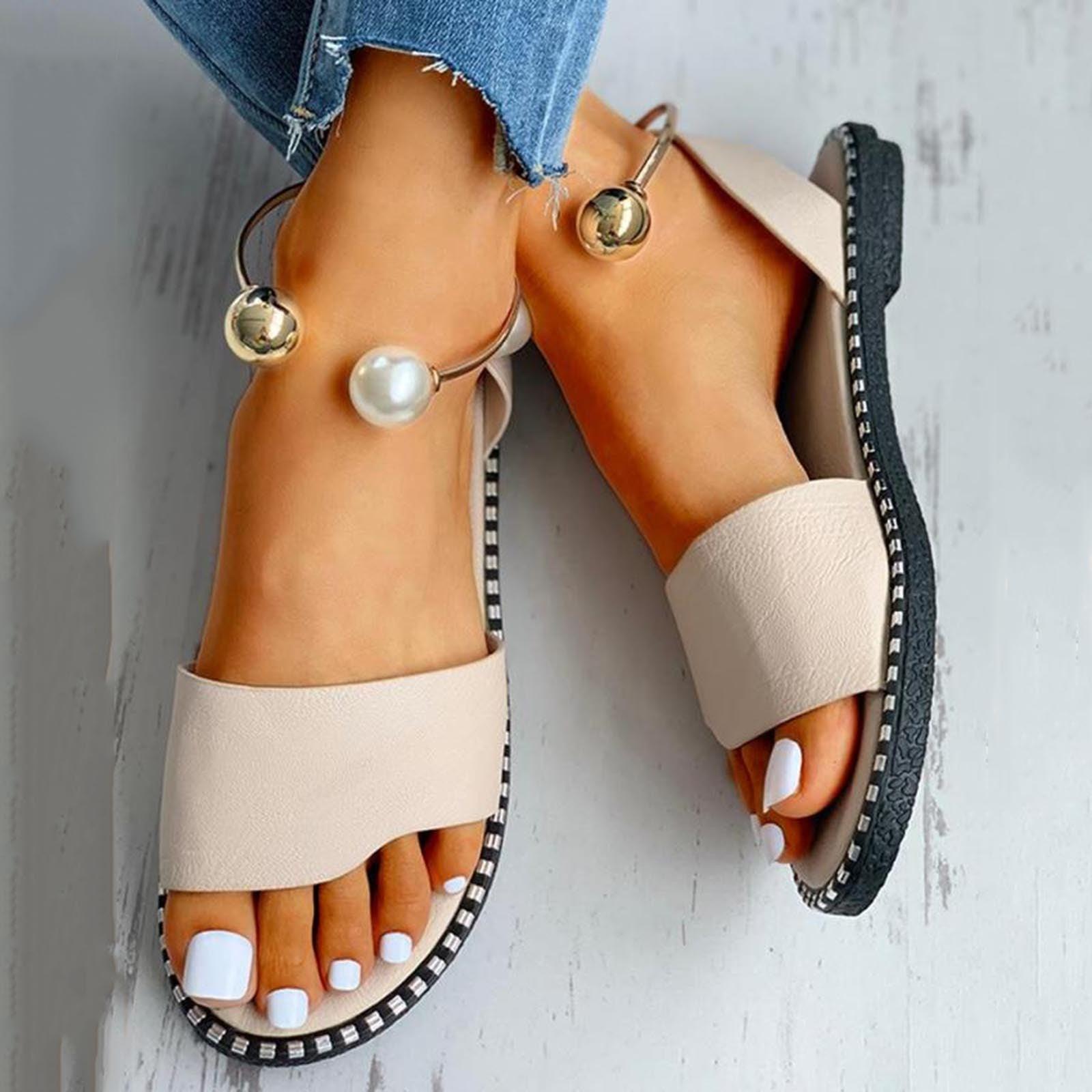 Stevvex white women’s fashion sandals with round toe, pearl buckle, strappy design, suitable for summer outdoor and wedding wear.
