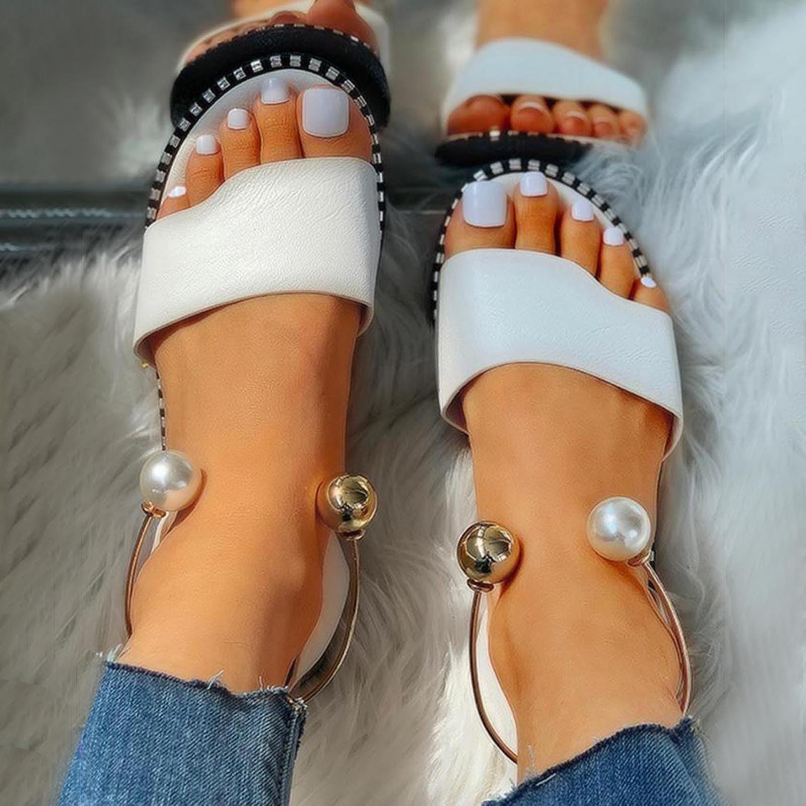 Stevvex white women's fashion sandals with pearl buckle, round toe, strappy design, suitable for summer outdoor casual or wedding wear.