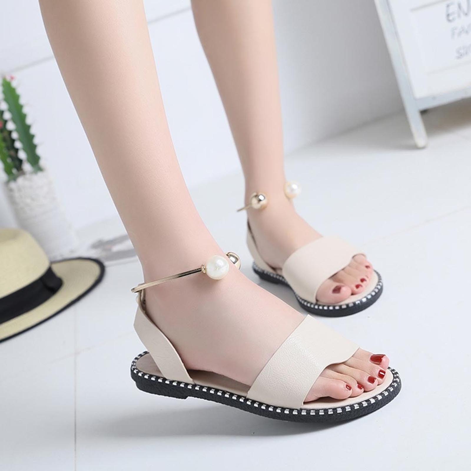 Stevvex white women's fashion sandals with round toe, pearl buckle, strappy design, ideal for summer outdoor wear and weddings.