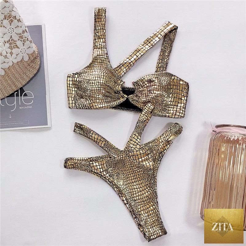 Elegant women’s snake print gold bikini set with shiny two-piece bandage swimwear, featuring string bikini style and stylish design.
