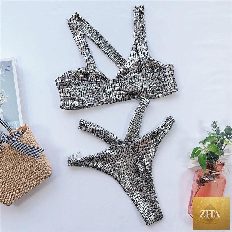 Elegant Stevvex women’s snake bikini set with shiny gold two-piece swimsuit featuring bandage design and string ties.