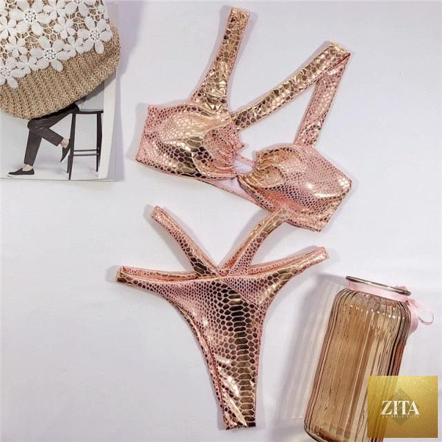 Elegant Stevvex women’s snake print bikini set with shiny gold string design, featuring a two-piece swimwear with bandage style and stylish details.