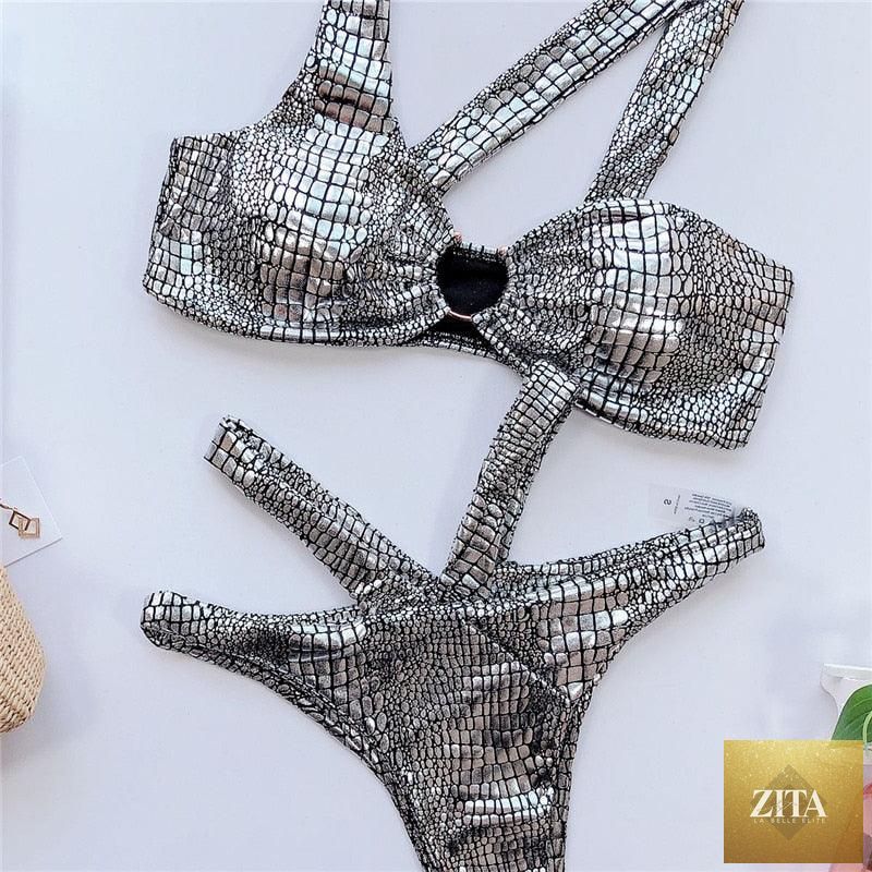 Elegant women's snake print bandage bikini set with shiny gold accents, featuring a two-piece string swimsuit and stylish swimwear design.