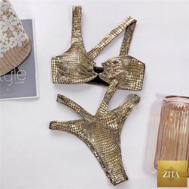Elegant Stevvex women's snake print bandage bikini set with shiny gold two-piece swimsuit, featuring string-style swimwear and stylish design.