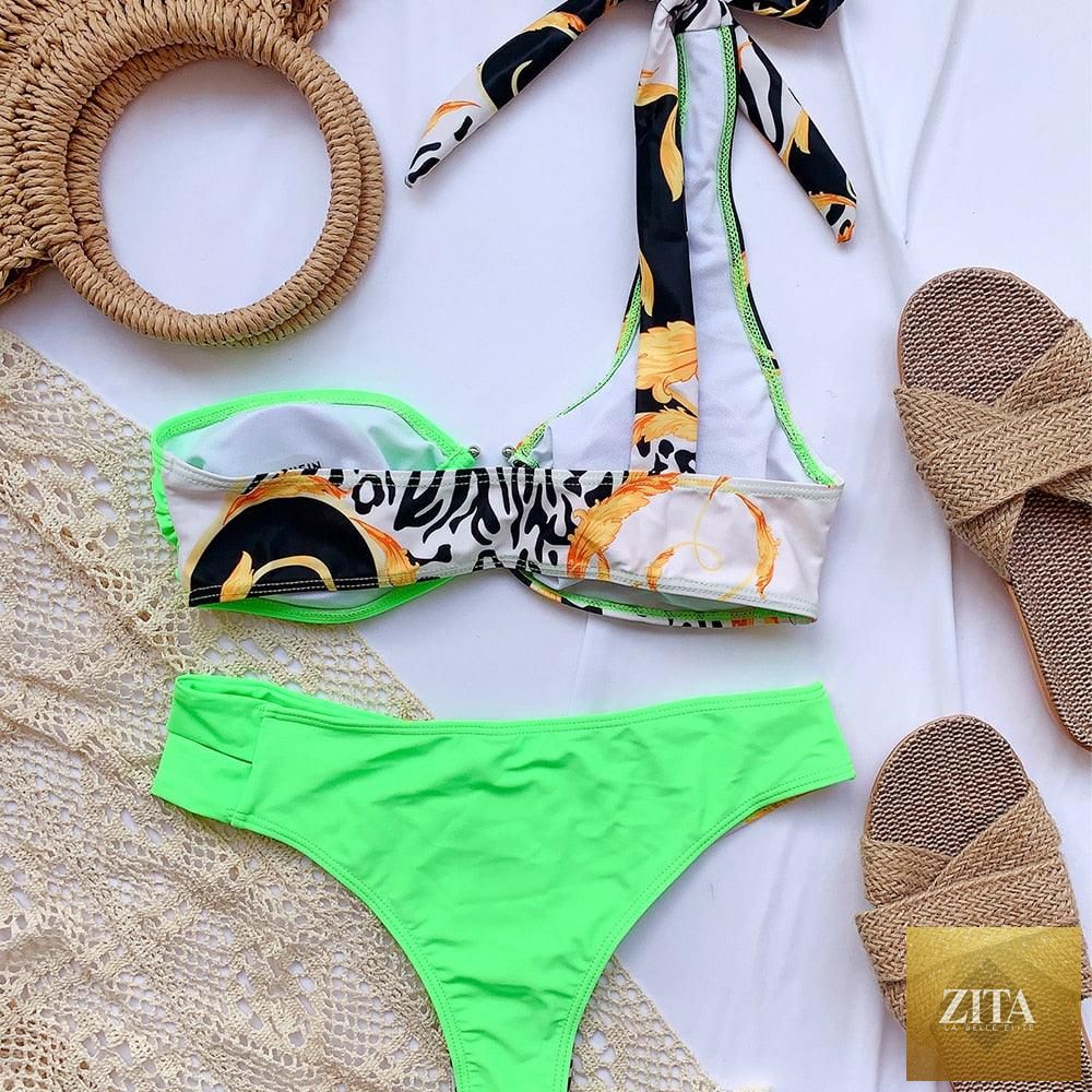Elegant women's one-shoulder snake print bikini with matching two-piece swim dress, perfect for spring beach and surf.