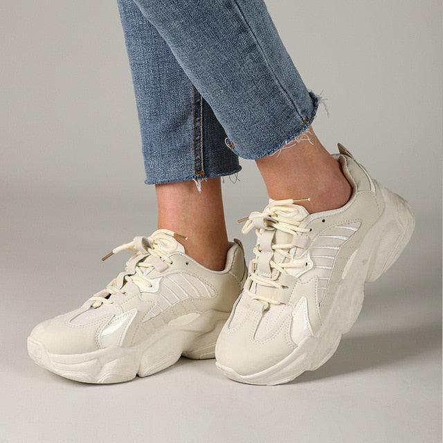 Elegant Stevvex women's sneakers with lace-up design, thick platform, leather upper, and casual comfortable footwear for everyday walking.