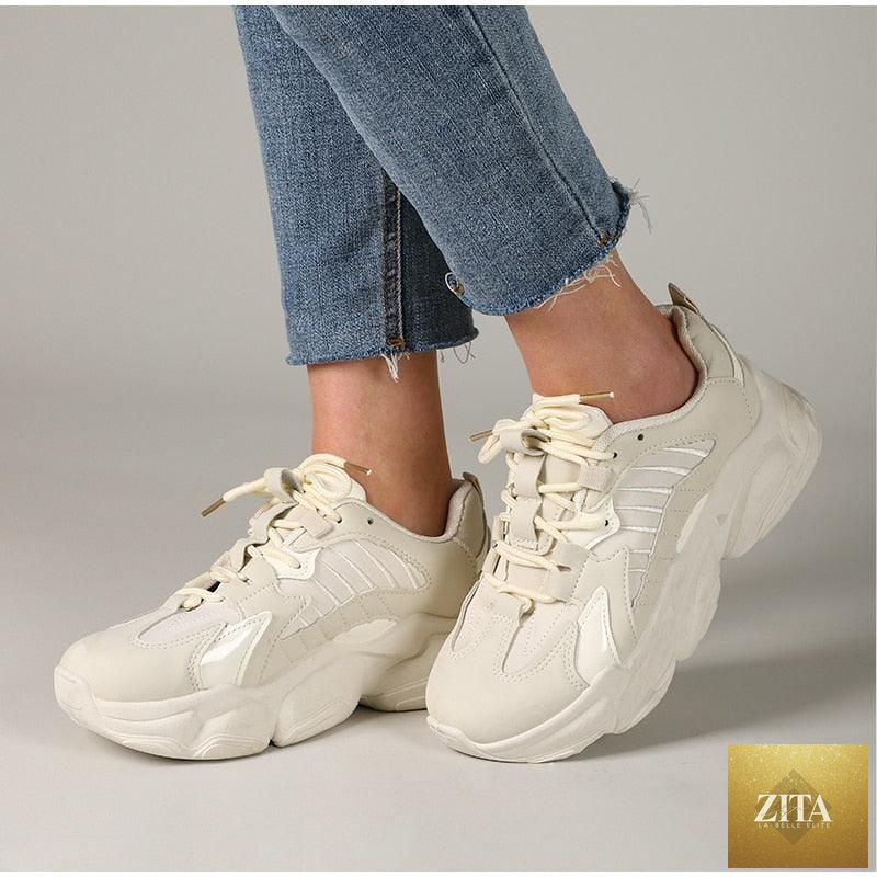 Elegant women's Stevvex sneakers with lace-up design, thick platform, leather upper, and casual lightweight walking style.