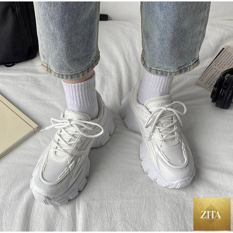 Elegant women's Stevvex sneakers with lace-up design, thick platform sole, leather upper, and casual comfortable walking style.