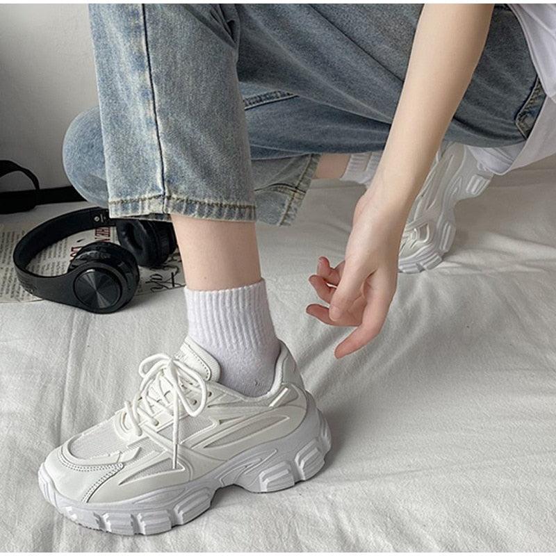 Elegant women's Stevvex sneakers with lace-up design, thick platform, leather upper, and casual lightweight walking footwear.