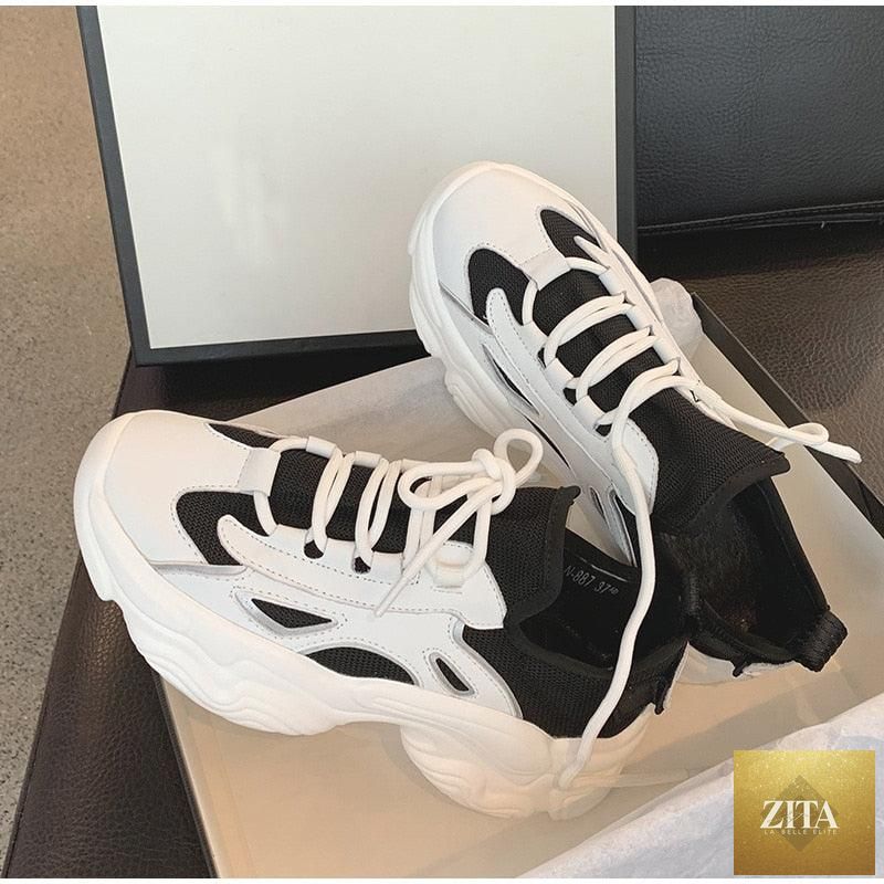 Elegant women's Stevvex sneakers with lace-up design, thick platform, leather upper, and casual lightweight sole for everyday walking.