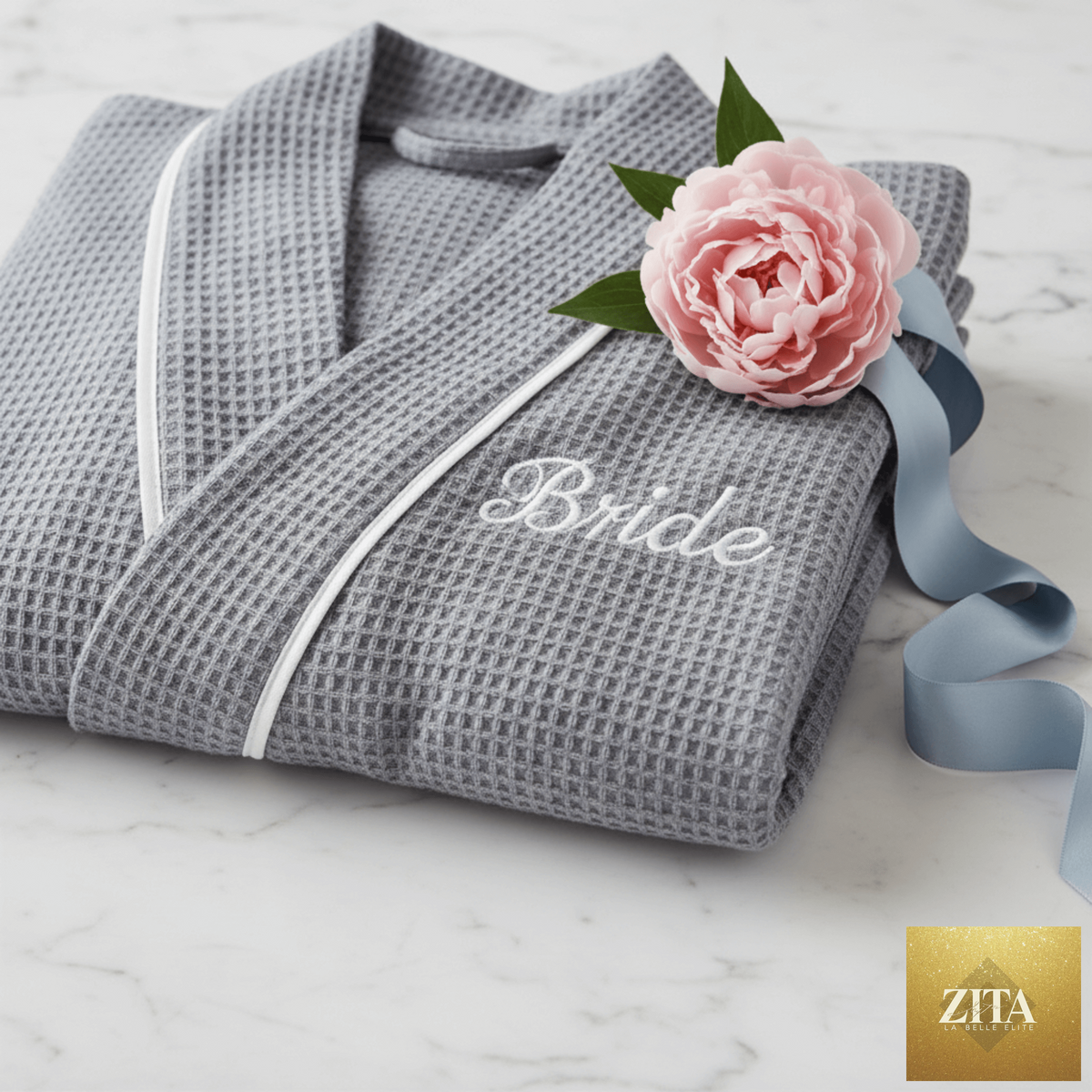 Knee-length Lotus Linen waffle robe for women with embroidered details, soft and cozy for relaxed comfort.