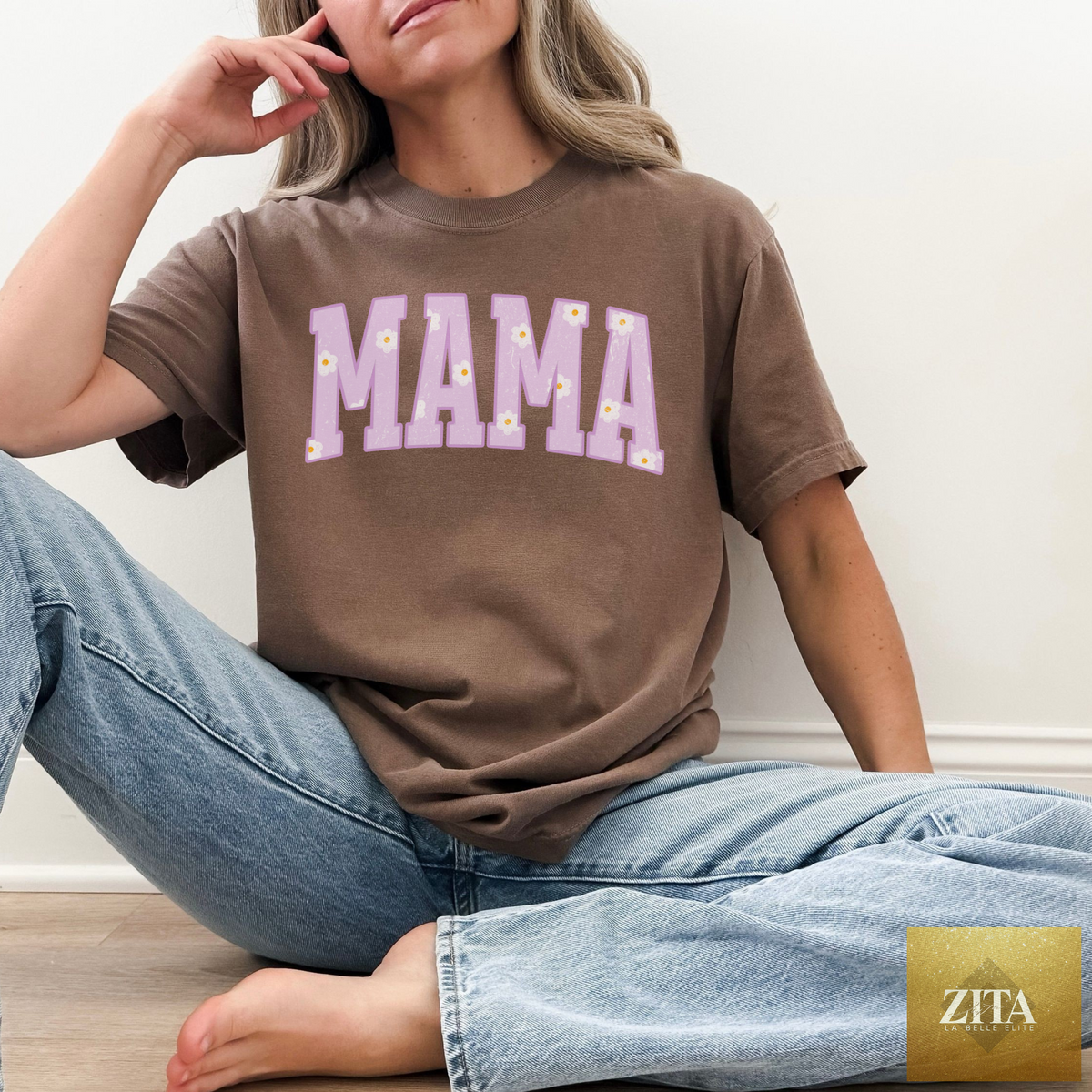 Hey Jude Graphic Tees MAMA Daisy Graphic Tee featuring a colorful daisy graphic on soft fabric.