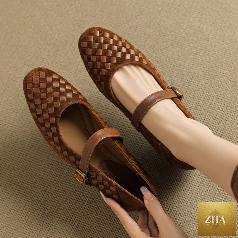 Women's sheepskin Mary Jane shoes by FitiqueFit with a single strap, round toe, and flat leather sole, shown from a side angle.