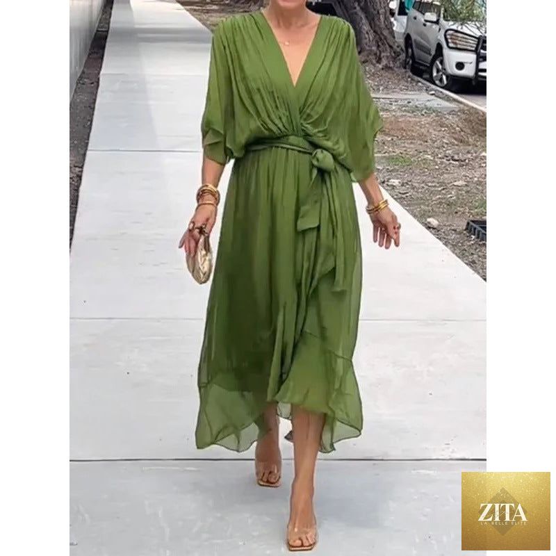 FitiqueFit Batwing Sleeve V-Neck Midi Dress with tied irregular hem, flowing silhouette, and elegant design.