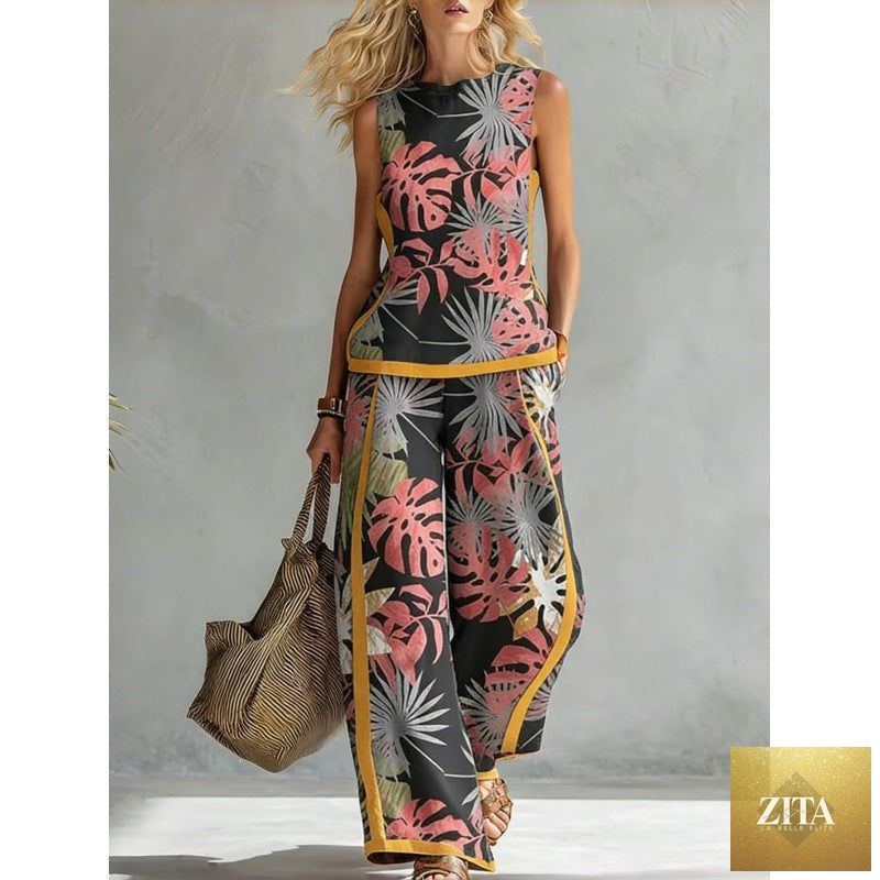 Printed retro sleeveless top and wide-leg pants set by FitiqueFit, showcasing colorful prints and stylish two-piece design.