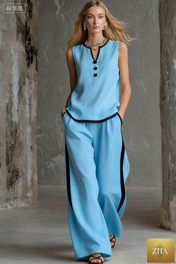 Women's minimalist sleeveless two-piece casualwear set by FitiqueFit, featuring a sleek top and matching shorts in a simple design.