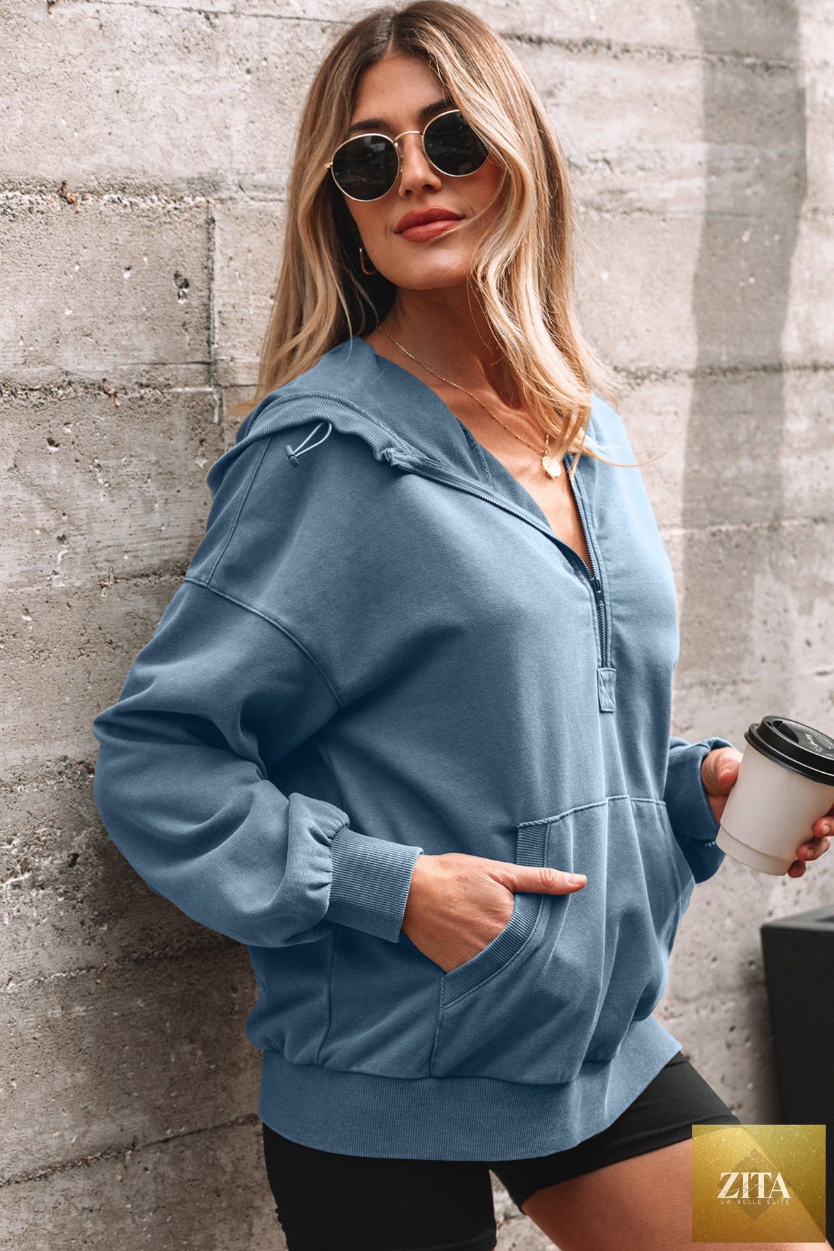 Black half-zip kangaroo pocket mineral wash hoodie from Wild and Free Boutique, featuring a relaxed baggy fit and casual style.