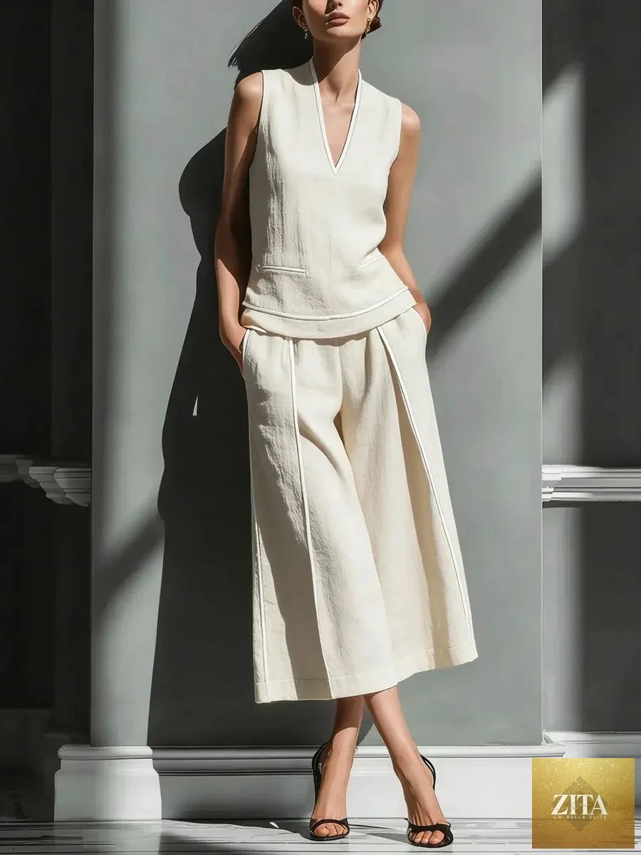 Women's sleeveless linen shirt and cropped pants set by Zita La Belle Elite, casual linen outfit for warm weather.