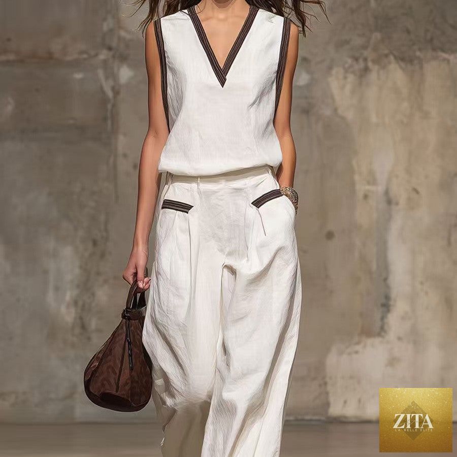 Women's minimalist sleeveless two-piece casualwear set by FitiqueFit, featuring a fitted top and matching high-waisted shorts.