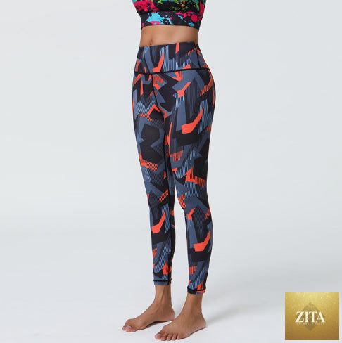 Women's high-waisted stretchy printed yoga fitness pants with a snug fit and vibrant pattern, ideal for activewear and yoga sessions.