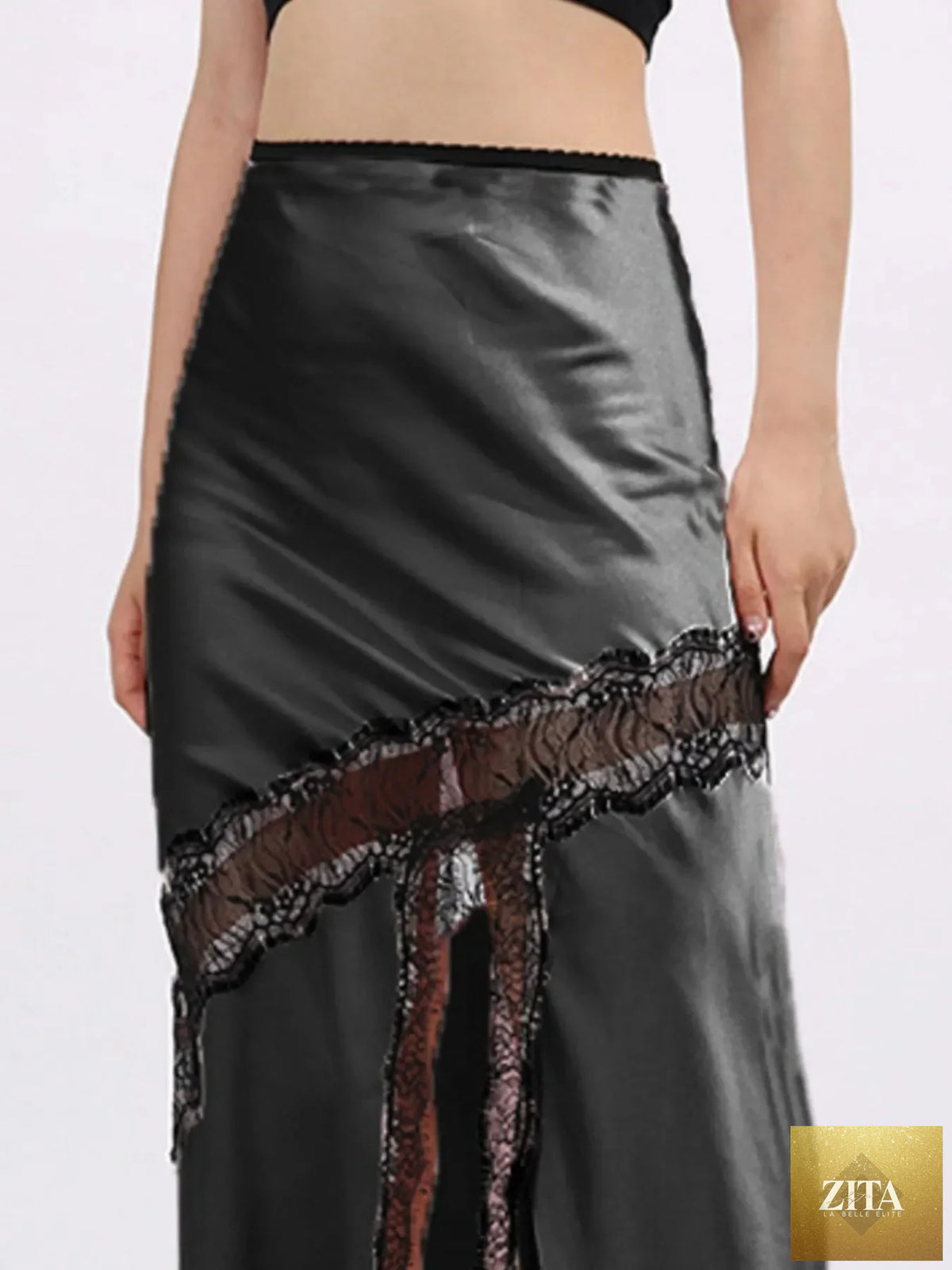 Zita La Belle Elite lace trim asymmetrical midi skirt displayed with flowing fabric and intricate lace details.