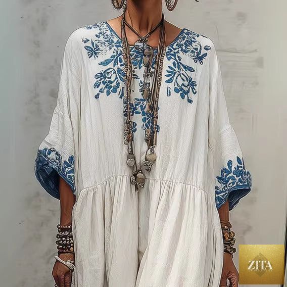Women's printed batwing sleeve midi dress by Zita La Belle Elite, loose fit linen blend fabric, featuring a vibrant floral pattern.