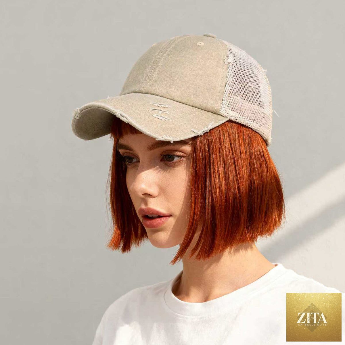 Distressed washed mesh baseball cap by Zita La Belle Elite, unisex frayed hat for outdoor and daily wear, showing front view.