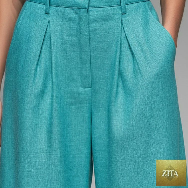 Women’s sleeveless vest and wide-leg pants casualwear set by Zita La Belle Elite, showing the stylish vest and flowing pants.