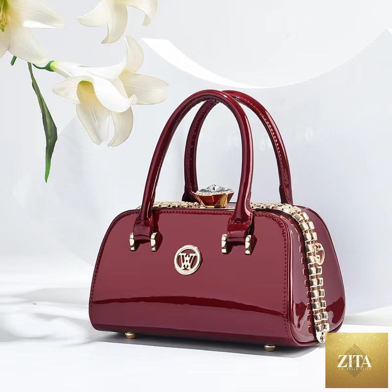 Shiny leather women's evening clutch bag with diamond embellishments, featuring a simple, elegant, multi-functional design.