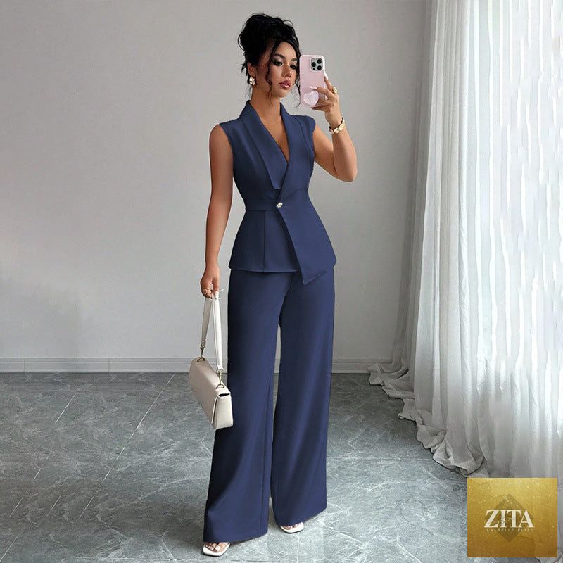 Women's MERIDGE peplum sleeveless blazer and wide-leg pants two-piece set, featuring a tailored blazer and flowing trousers.