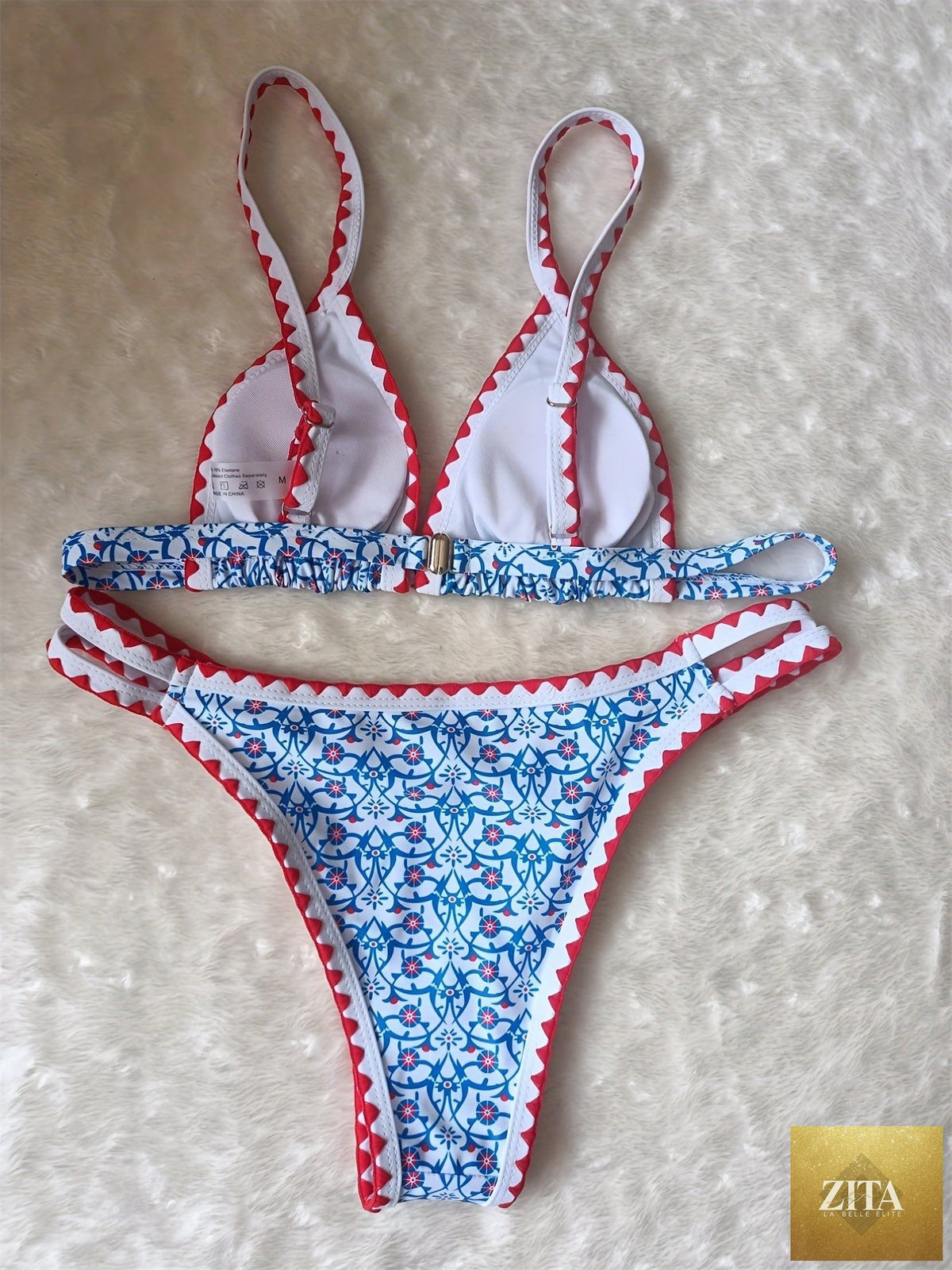 Stevvex floral print high-cut bikini set with embroidered cut-out triangle top, contrast trim, and back buckle, perfect for summer beachwear