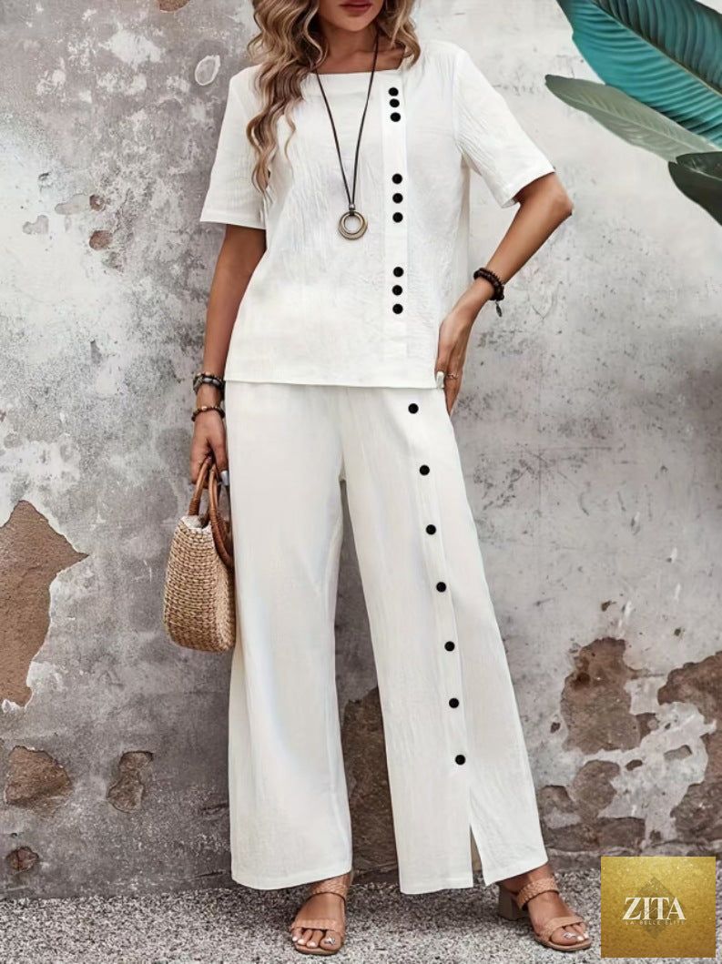 Women’s linen casualwear top and loose fit two-piece set by Zita La Belle Elite, featuring button-up design and relaxed fit.