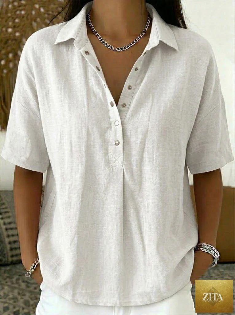 Solid color women's short sleeve button pullover shirt by Zita La Belle Elite, featuring a classic collar and relaxed fit.