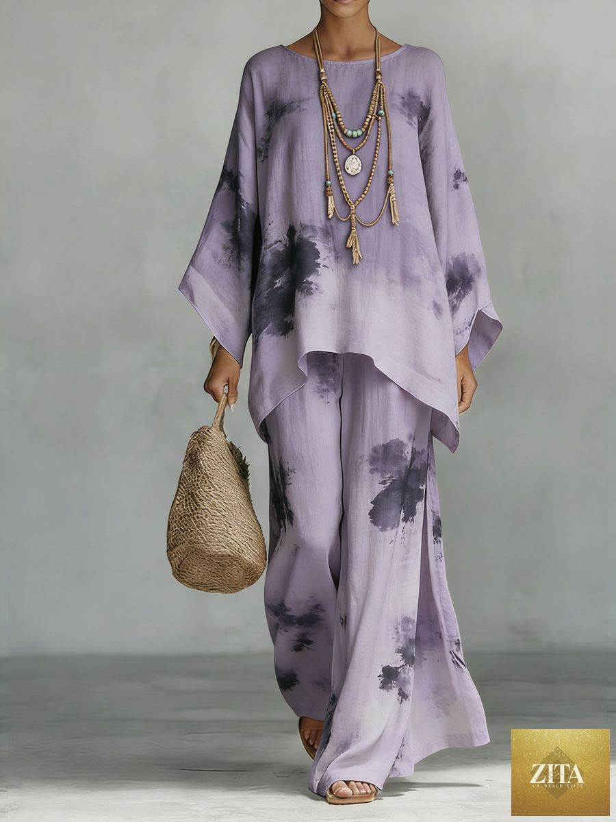 Floral print bamboo linen two-piece set with wide-leg pants by MERIDGE, featuring a matching top and flowing trousers.