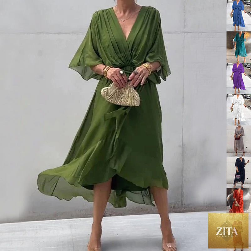FitiqueFit Batwing Sleeve V-Neck Midi Dress with tied irregular hem, flowing fabric and elegant silhouette.