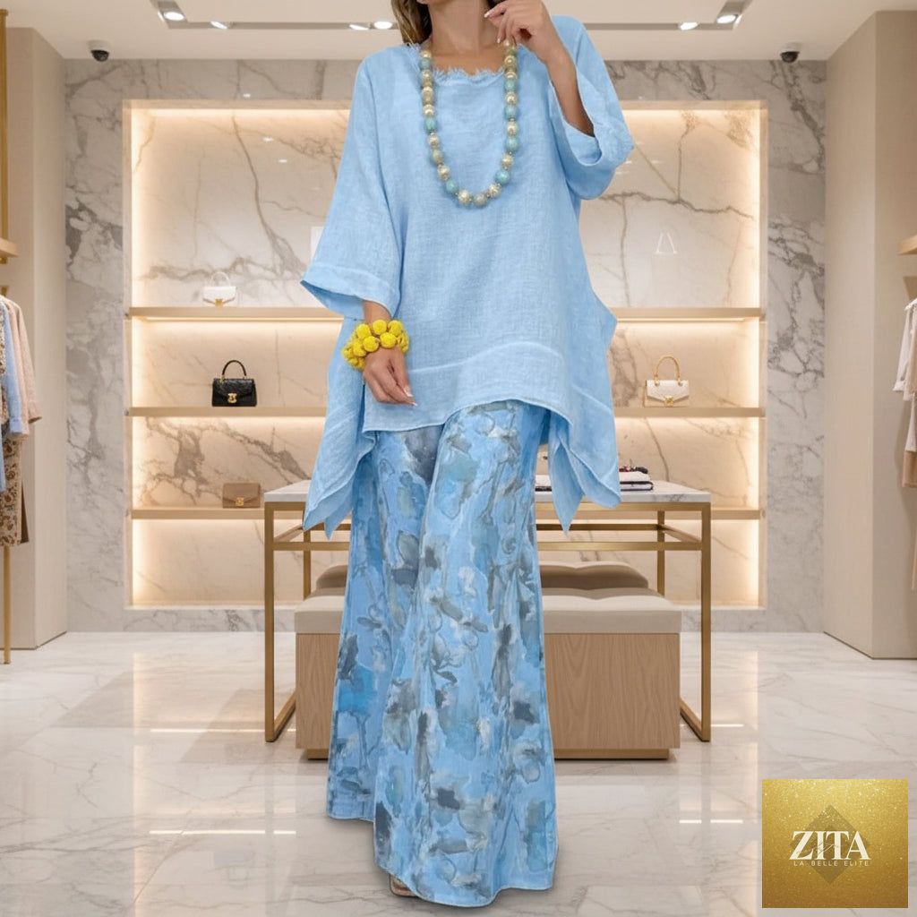 Women's linen-style tunic top and watercolor floral wide-leg pants set by MERIDGE, featuring a relaxed fit and vibrant floral pattern.