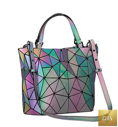 Geometric laser-cut women's handbag and crossbody bag with stylish design, black color, and adjustable strap from Trendy Attic Store01.