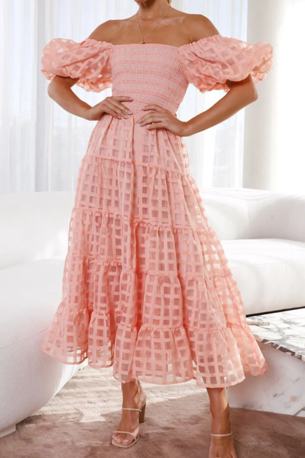 Off shoulder short puff sleeve midi dress from Shopiebay, shown in a stylish design with a fitted bodice and flowing skirt.
