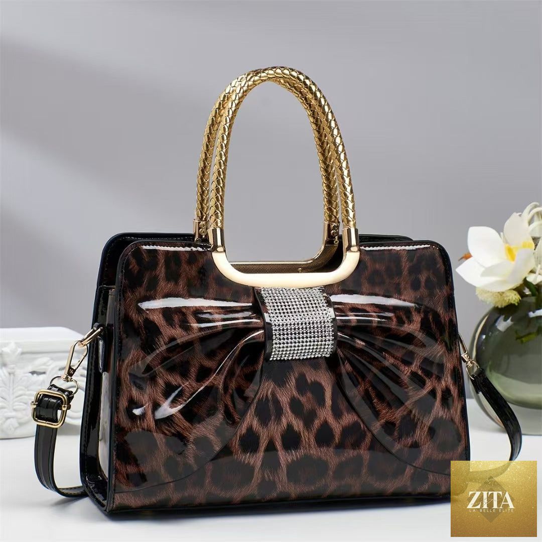 Elegant leopard-print women's handbag with hot-stone embellishments, made from genuine leather, versatile and fashionable.
