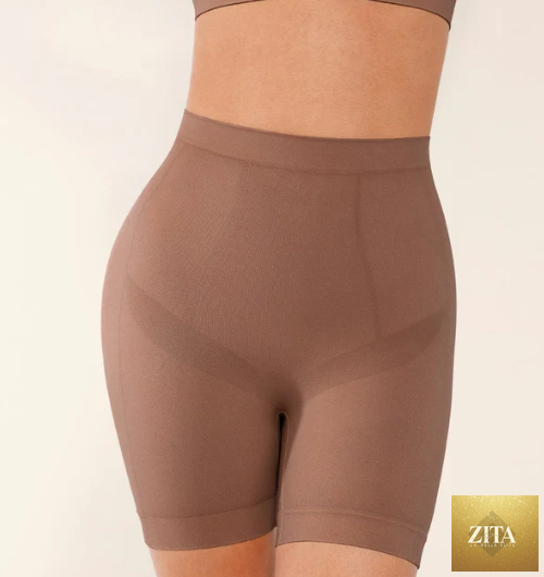Seamless mid-rise tummy control shorts from My Store, form-fitting and designed to shape the waist and hips.