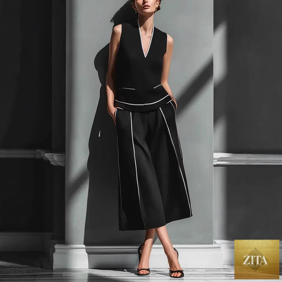 Women's sleeveless linen shirt and cropped pants set from Zita La Belle Elite, casual summer outfit, light and breathable fabric.