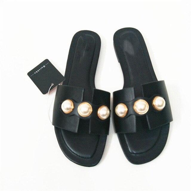 Stevvex pearl flat sandals for women, casual beach flip flops with slip-on design and decorative pearls, perfect for summer and bridal wear.