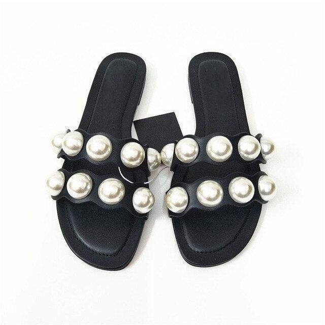 Stevvex pearl flat sandals for women with slip-on design, casual beach flip flops, and dressy flat slippers with pearl embellishments.